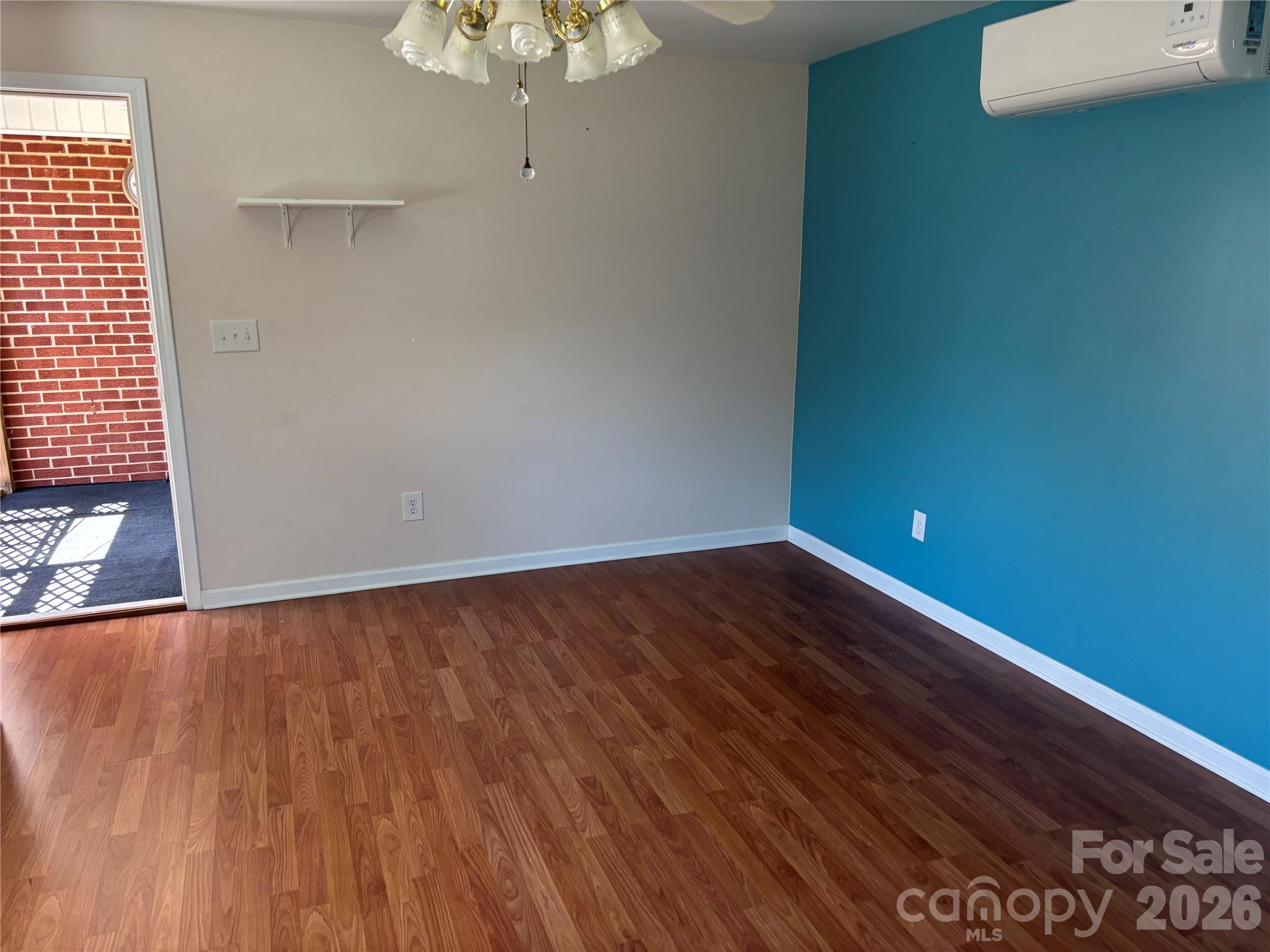 503 9th Avenue Southwest Conover, NC 28613 - Photo 33 of 39 a view of a room with wooden floor and a window