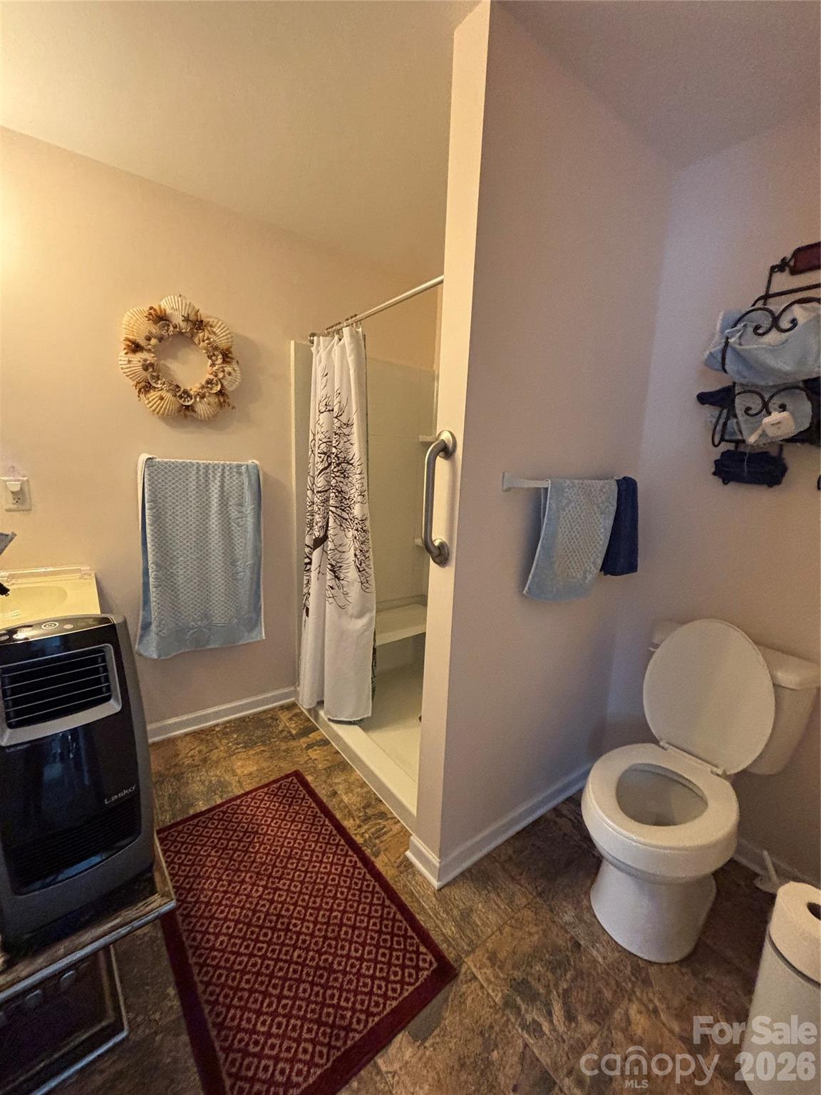 503 9th Avenue Southwest Conover, NC 28613 - Photo 36 of 39 a bathroom with a toilet and a shower