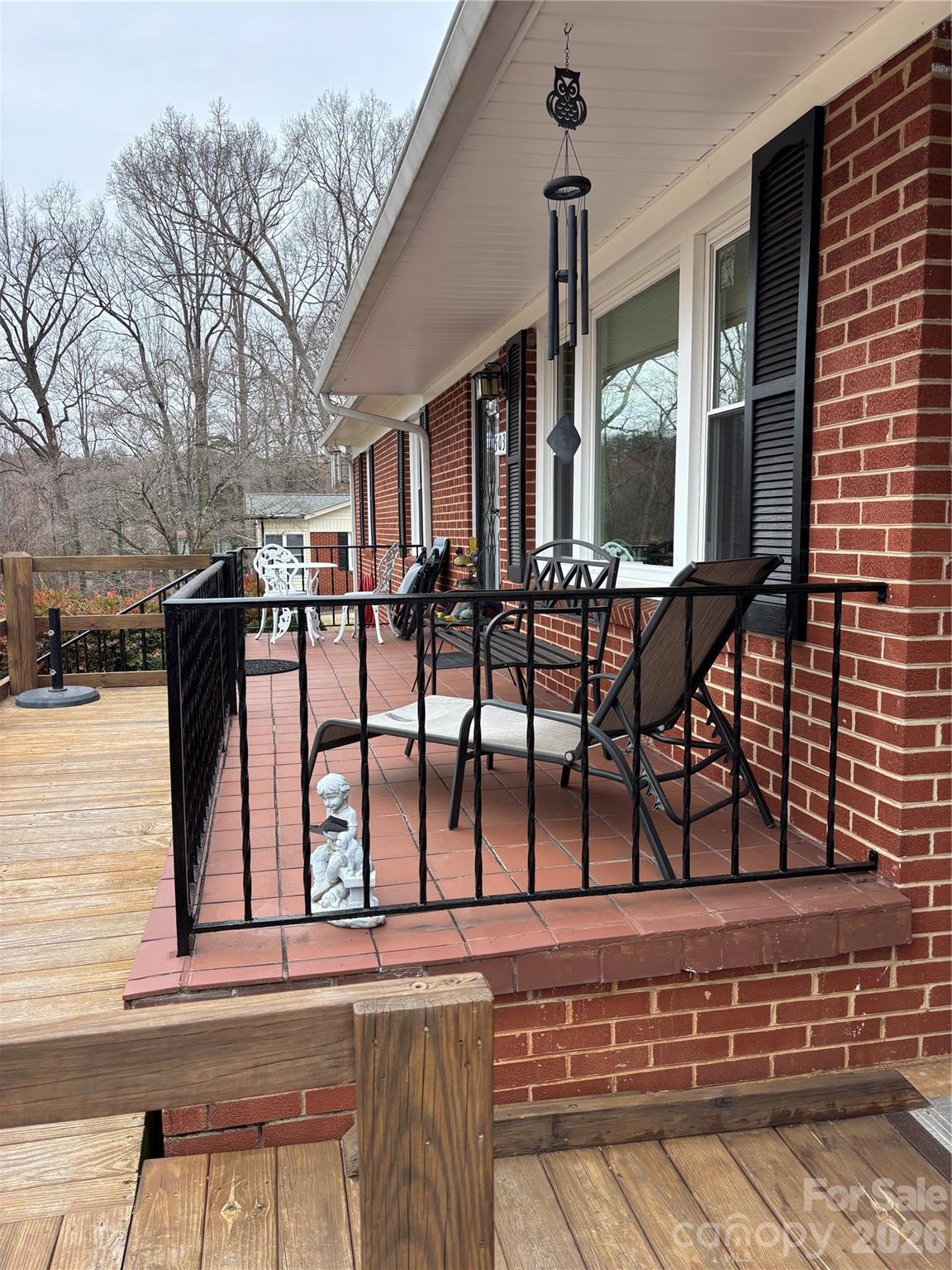 503 9th Avenue Southwest Conover, NC 28613 - Photo 5 of 39 a view of a chairs and table on the terrace