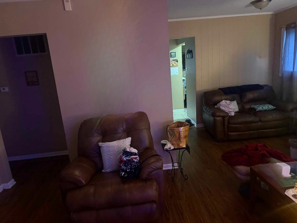 1375 Forest Place Calumet City, IL 60409 - Photo 2 of 7 a living room with furniture and a fireplace