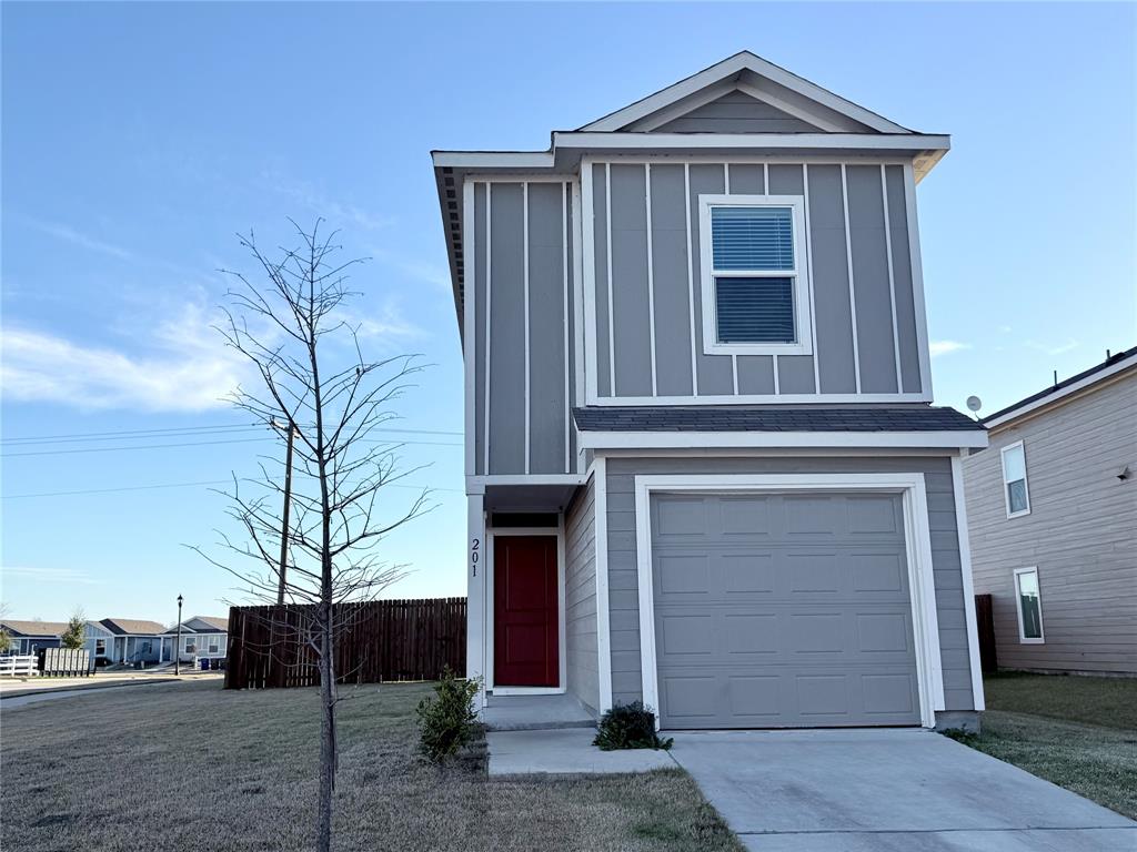 201 Boxberry Way Princeton, TX 75407 - Photo 2 of 24 a front view of a house with a yard