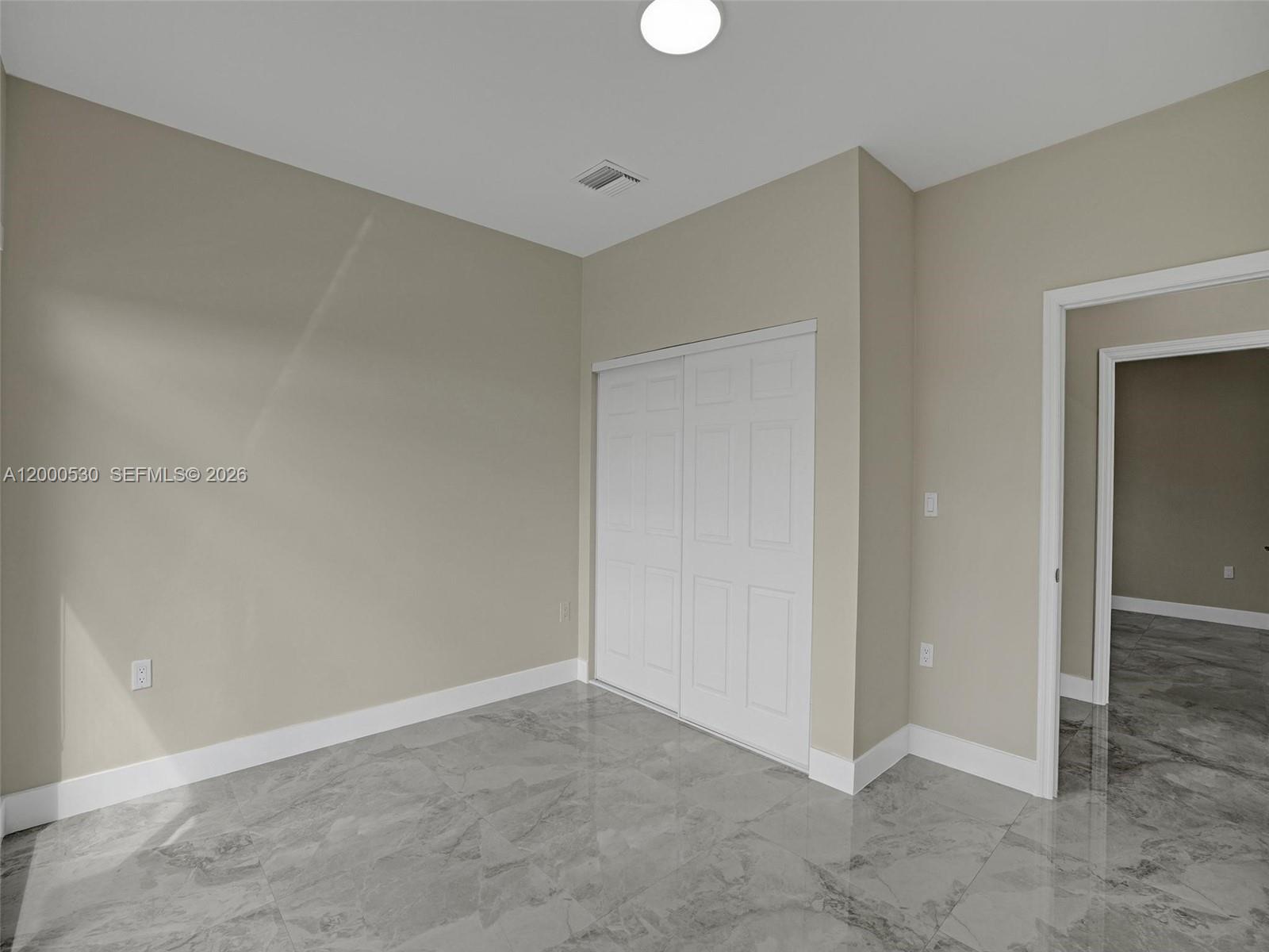 14519 Southwest 272nd Street, Unit 14519 Homestead, FL 33032 - Photo 12 of 32 a view of an empty room