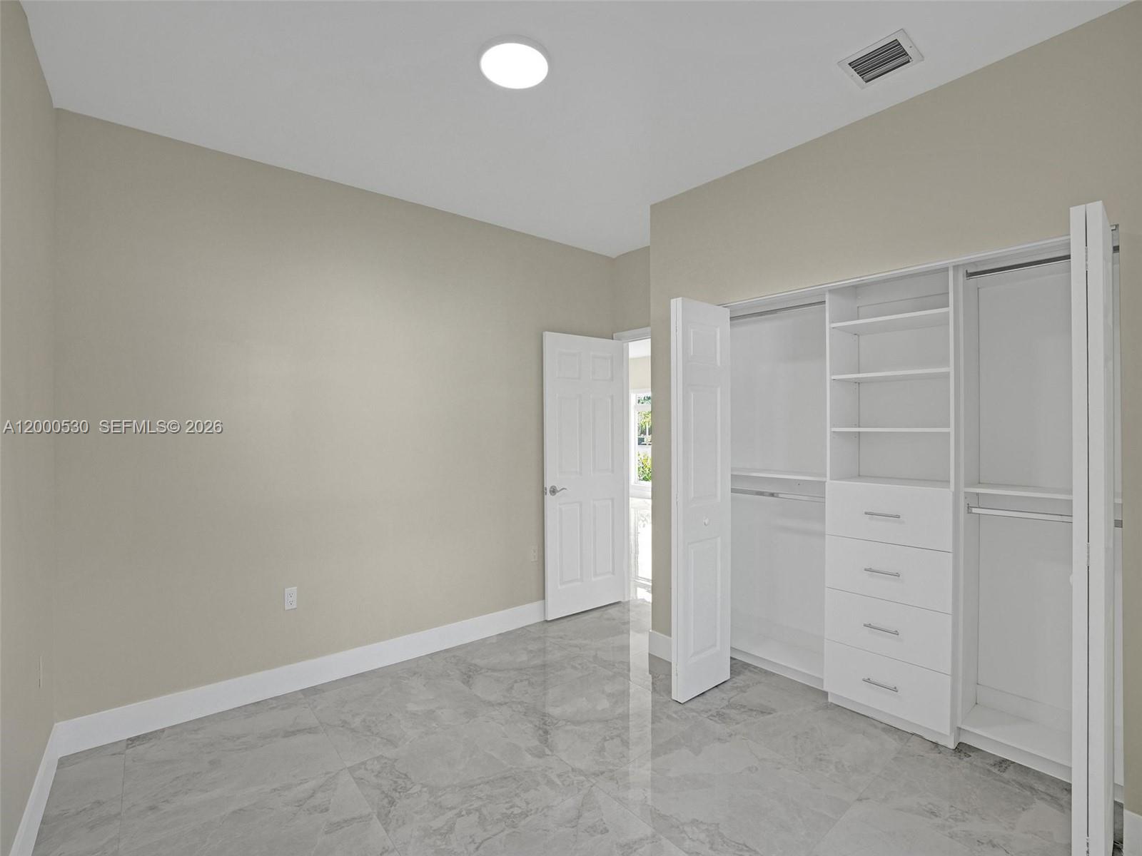 14519 Southwest 272nd Street, Unit 14519 Homestead, FL 33032 - Photo 19 of 32 a view of an empty room