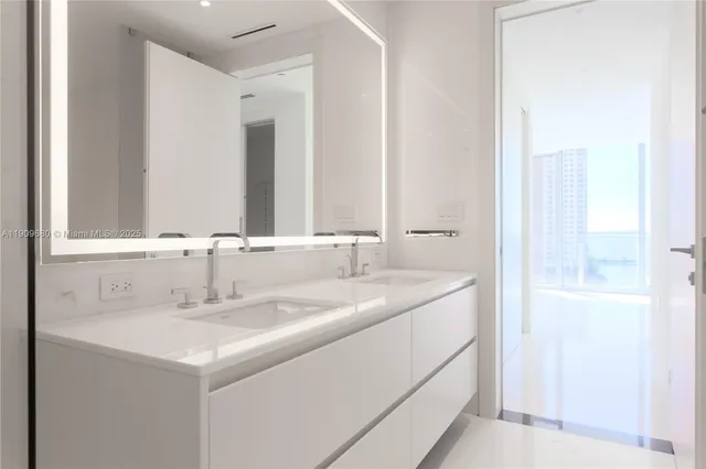 a bathroom with a sink and a shower