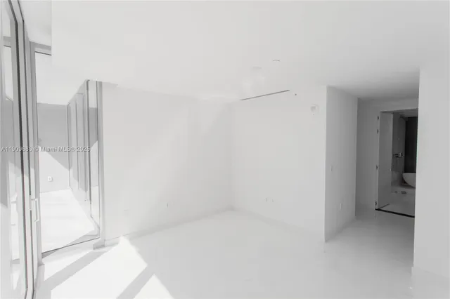 a view of a balcony with chairs