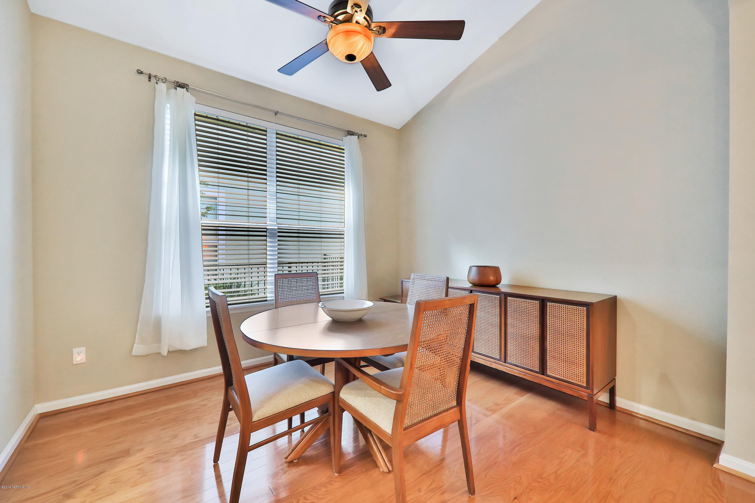 3417 South Saxxon Road St. Augustine, FL 32092 - Photo 8 of 47 a view of a dining room with furniture and window