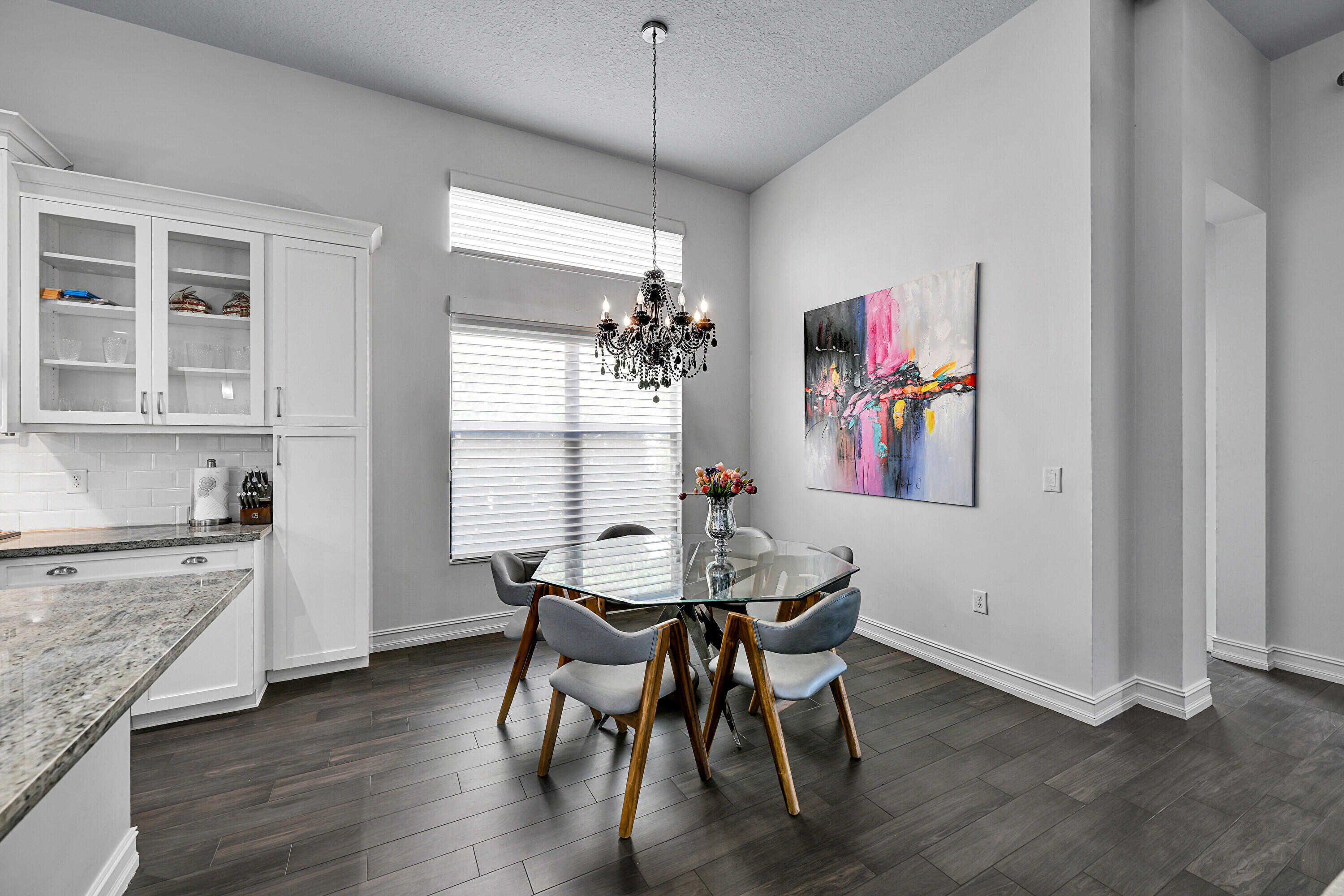 8652 Lewis River Road Delray Beach, FL 33446 - Photo 28 of 85 a view of a dining room with furniture window and wooden floor