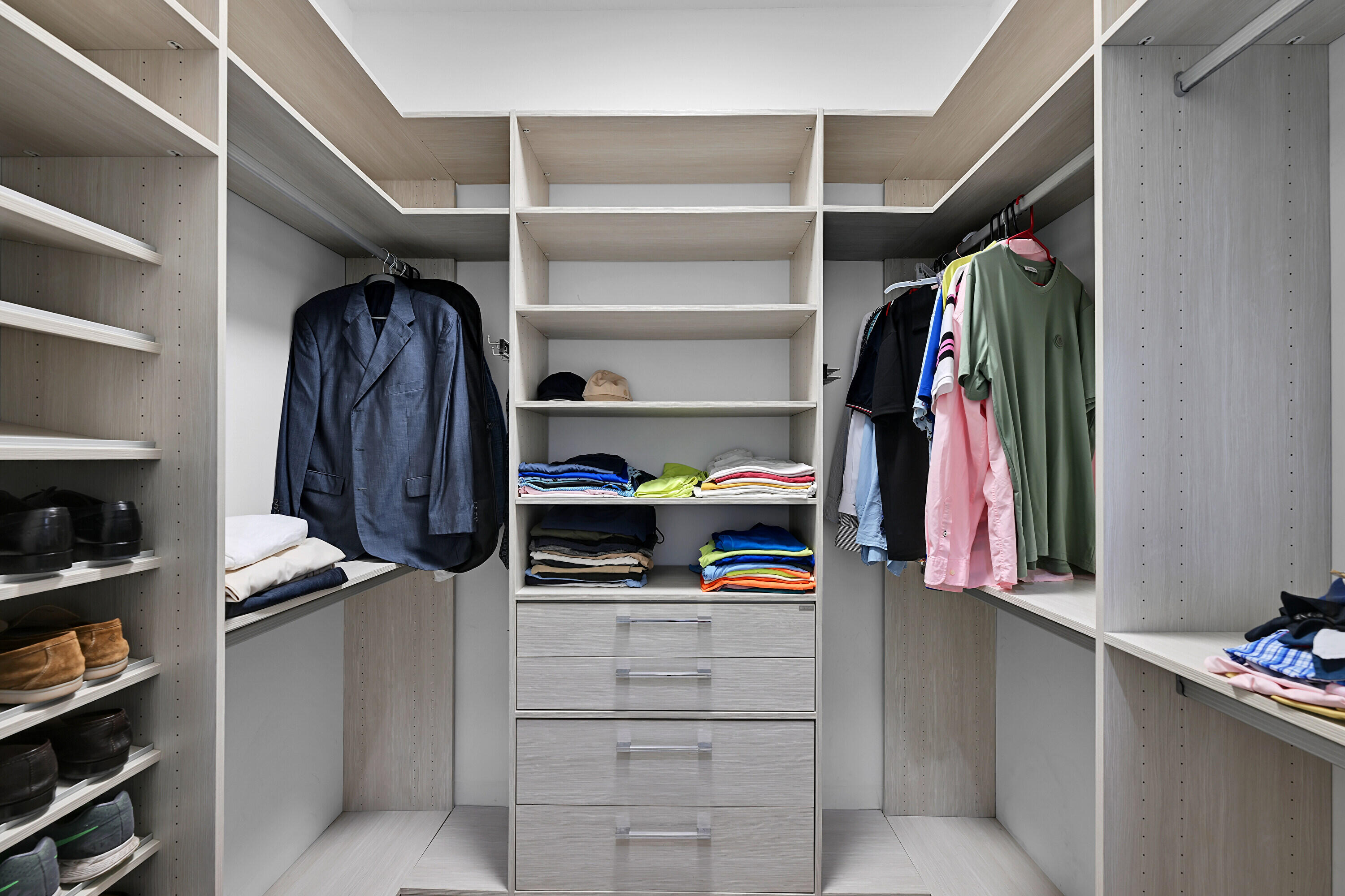 8652 Lewis River Road Delray Beach, FL 33446 - Photo 40 of 85 a view of walk in closet with clothes and shoes