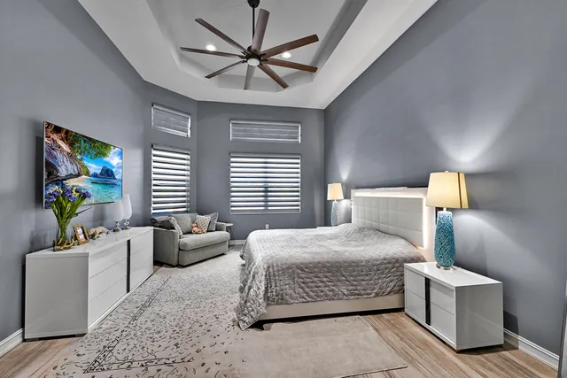 a view of a swimming pool with an outdoor space and seating area