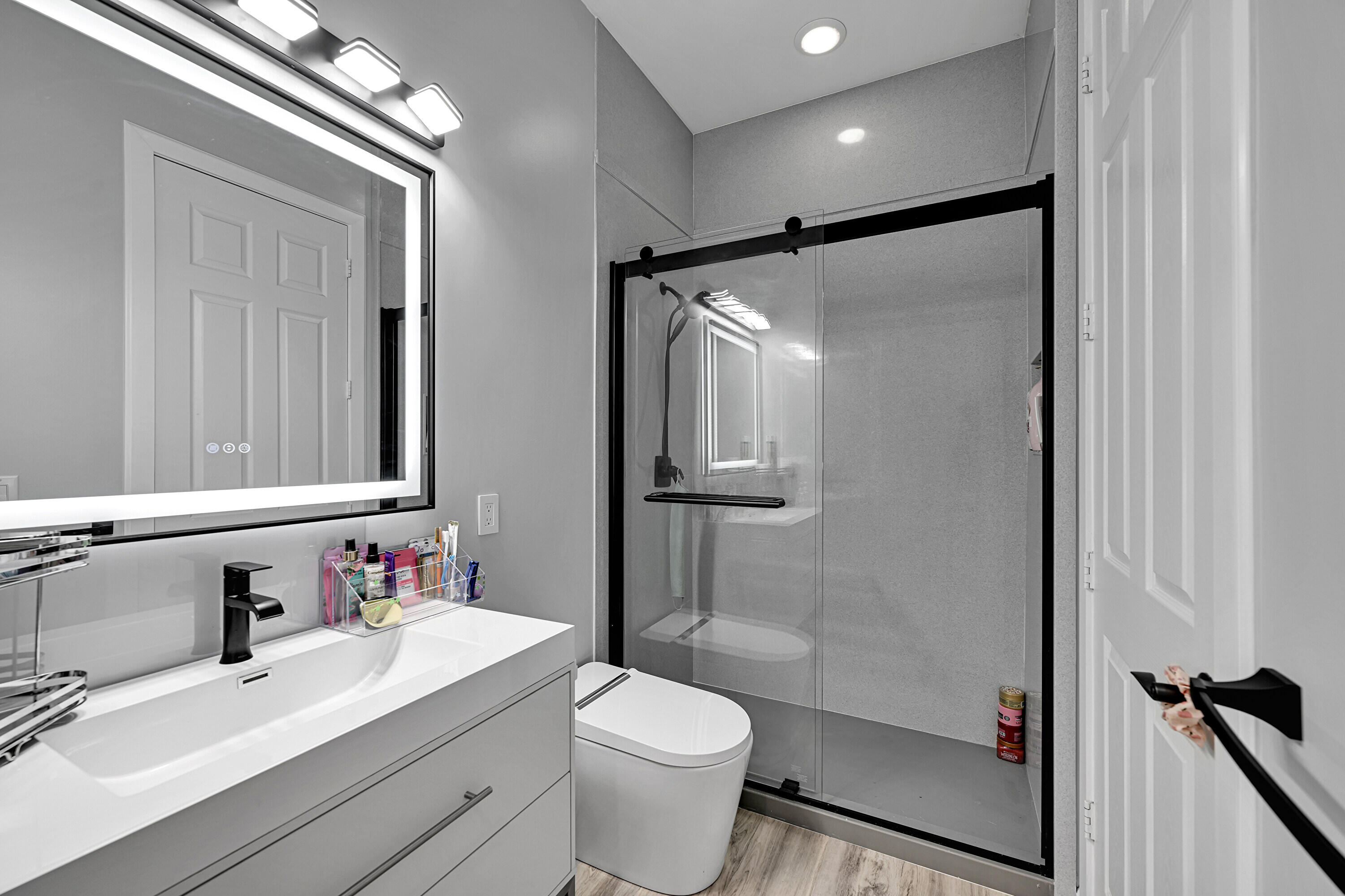 8652 Lewis River Road Delray Beach, FL 33446 - Photo 53 of 85 a bathroom with a sink toilet and shower