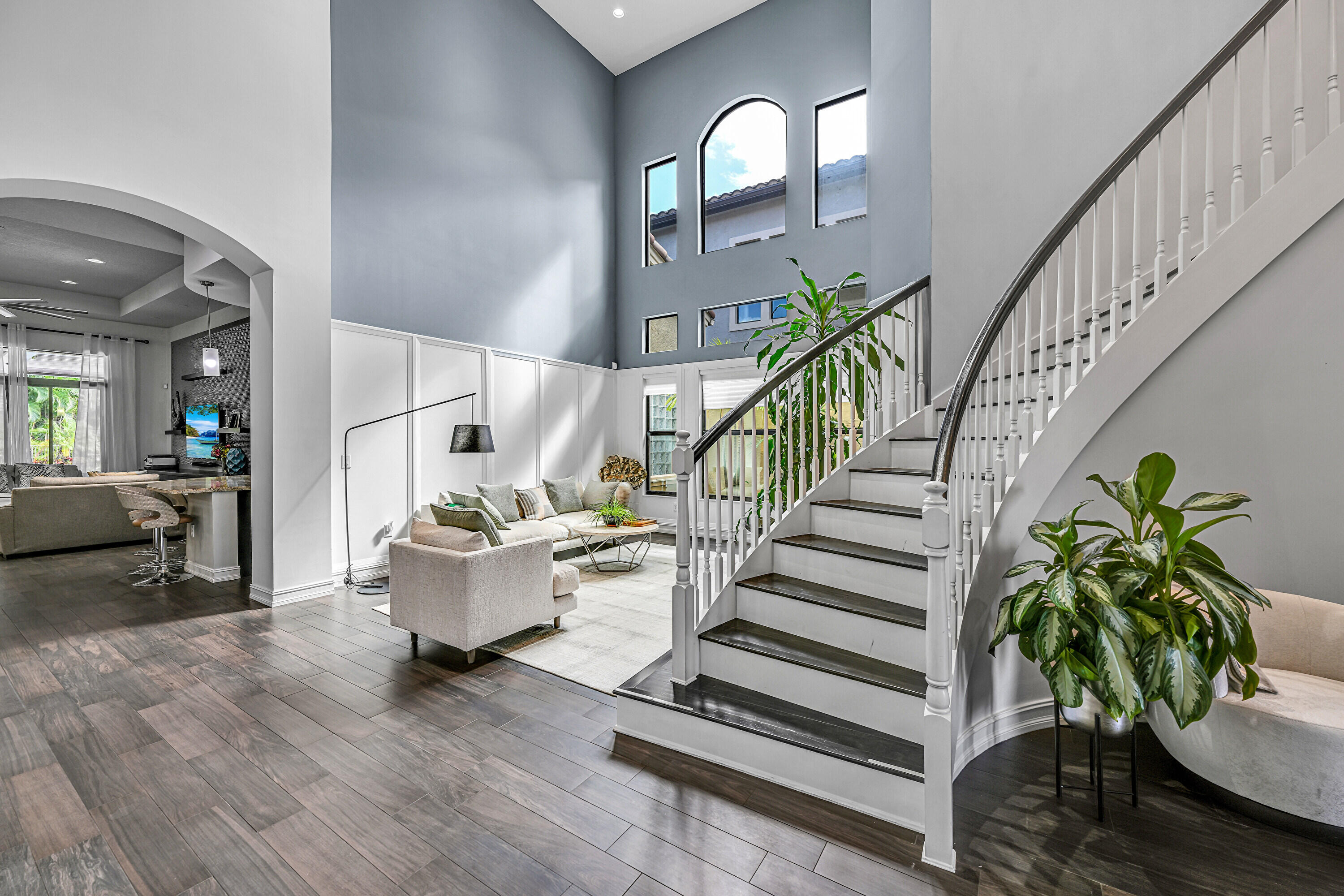 8652 Lewis River Road Delray Beach, FL 33446 - Photo 10 of 85 a living room with furniture and a potted plant