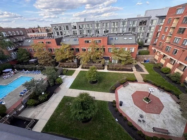 an aerial view of multiple house with yard