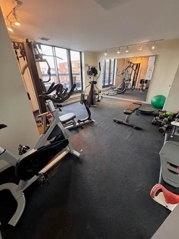 a view of a room with gym equipment