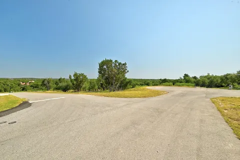 a view of a swimming pool and lake view