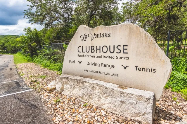 a sign on the side of the road