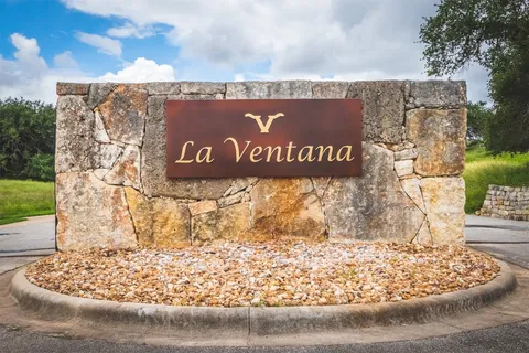 a view of outdoor space with sign board