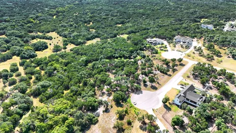 a view of a house with a tree