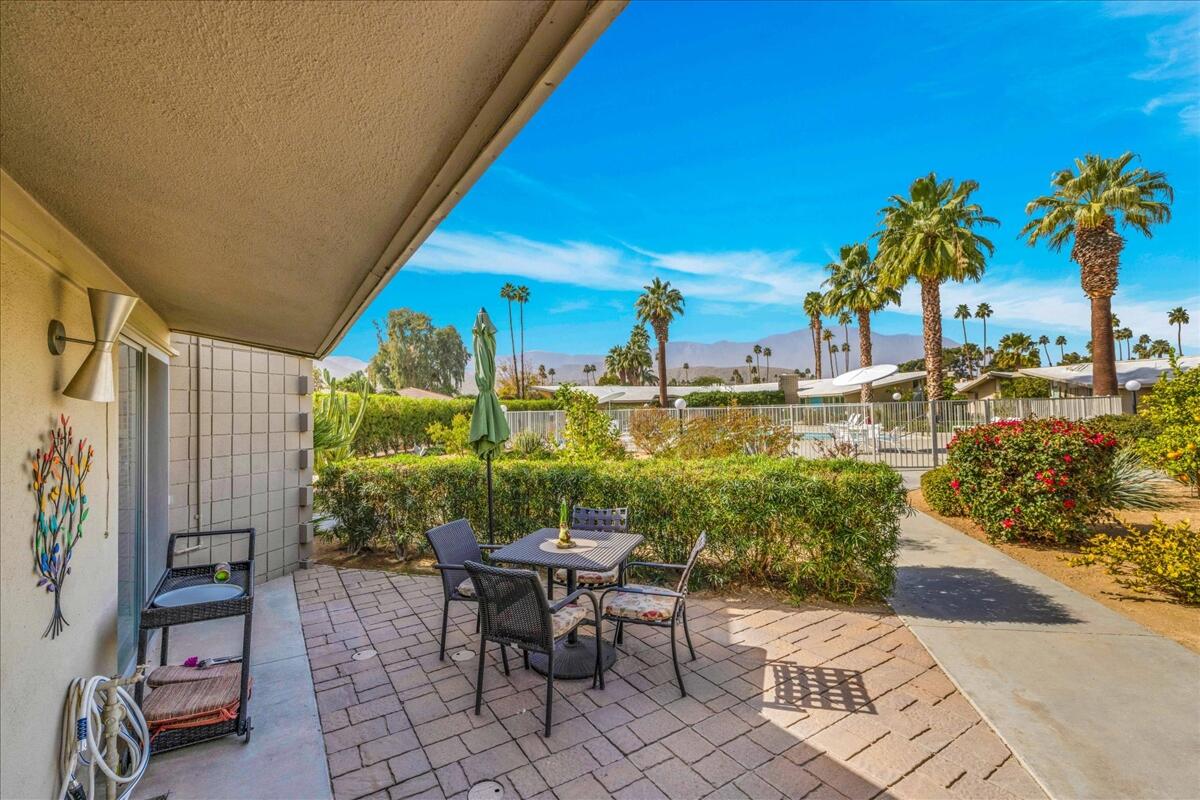 37800 Da Vall Drive, Unit 1 Rancho Mirage, CA 92270 - Photo 28 of 36 a view of a patio with a table and chairs