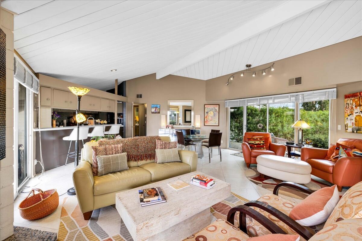 37800 Da Vall Drive, Unit 1 Rancho Mirage, CA 92270 - Photo 5 of 36 a living room with furniture and a large window