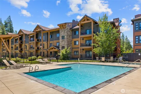 a view of a building with a swimming pool