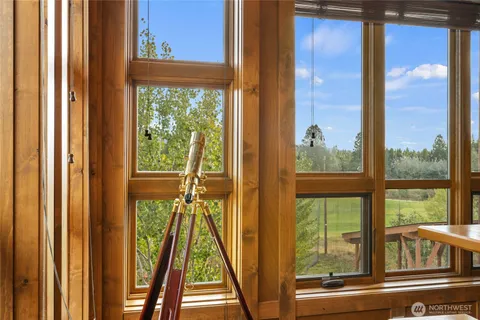 a view of a large window with an outdoor view
