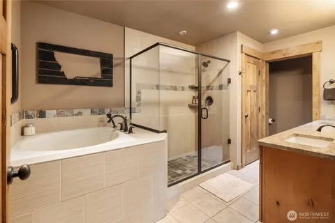 a bathroom with a sink and a shower