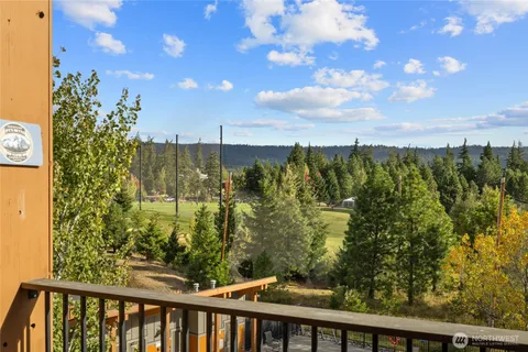 a view of a balcony with an outdoor space