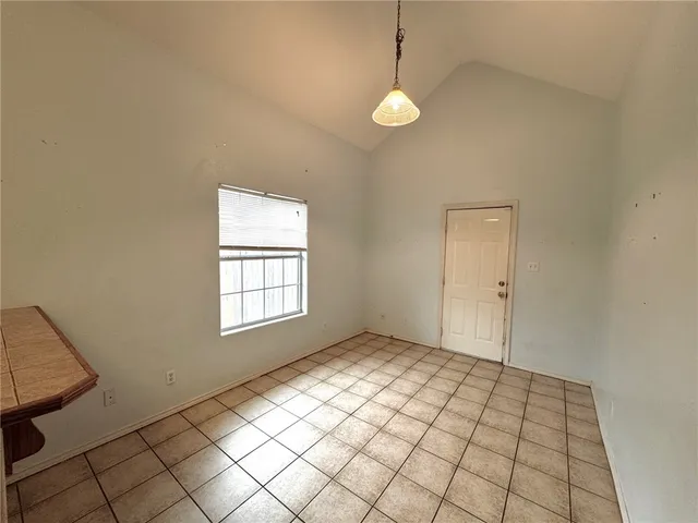 a view of an empty room and window