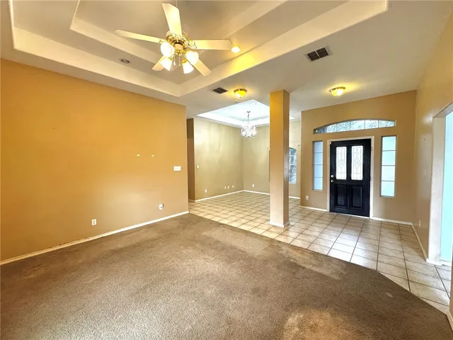 a view of livingroom with an empty room
