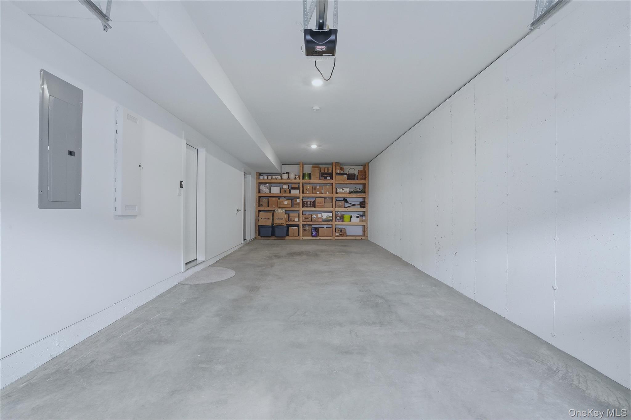 4010 Chestnut Rdg Road Fishkill, NY 12524 - Photo 36 of 43 2 car garage with extra shelving for storage