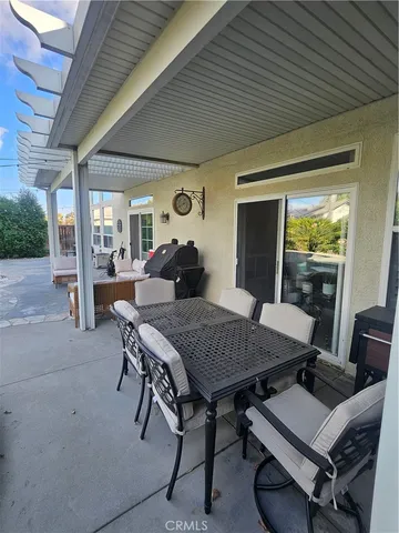 a view of a swimming pool with a yard