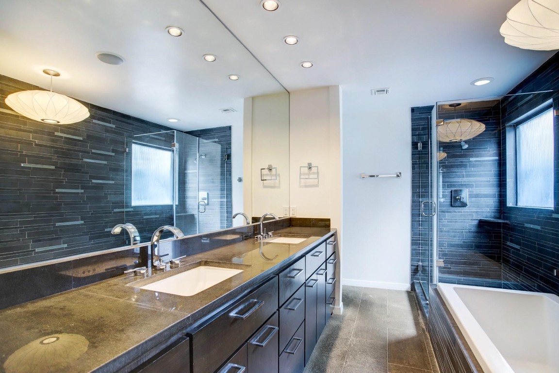 1417 Harold Street, Unit B Houston, TX 77006 - Photo 19 of 28 Dual sinks and generous built-ins for storage.