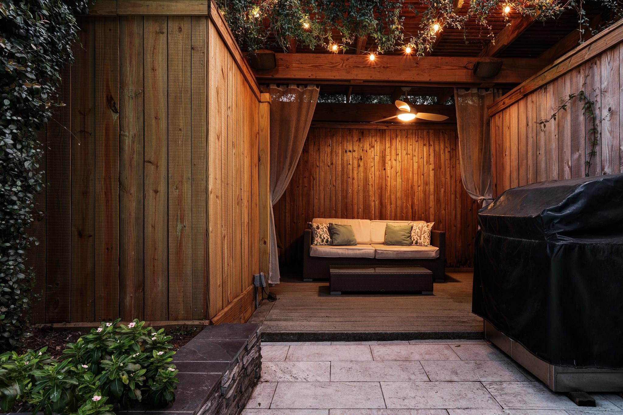 1417 Harold Street, Unit B Houston, TX 77006 - Photo 3 of 28 Cozy cabana creates ambiance in the backyard.