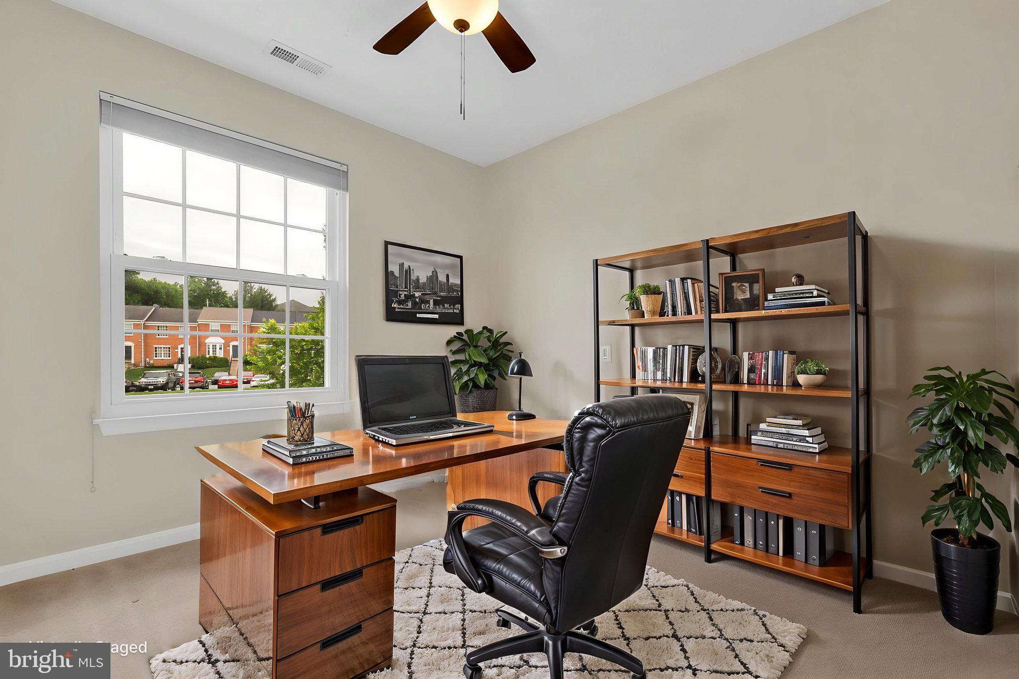 7150 Natures Road Columbia, MD 21046 - Photo 24 of 45 a view of a workspace with a bookshelf
