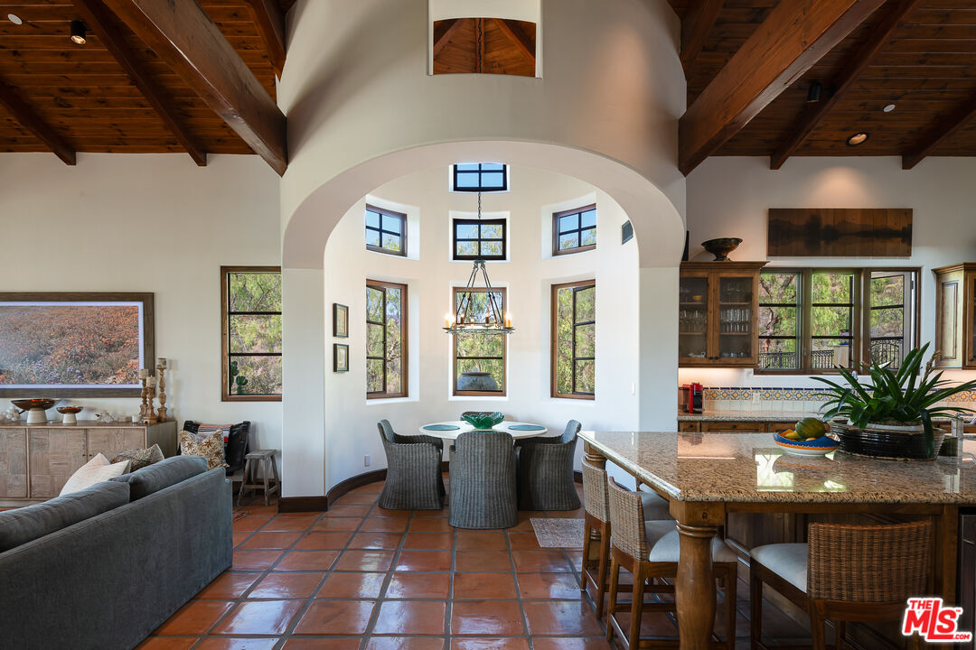 1101 Cold Canyon Road Calabasas, CA 91302 - Photo 11 of 60 a view of a livingroom with furniture and window