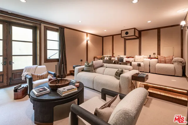 a spacious bathroom with a double vanity sink a mirror and a bathtub