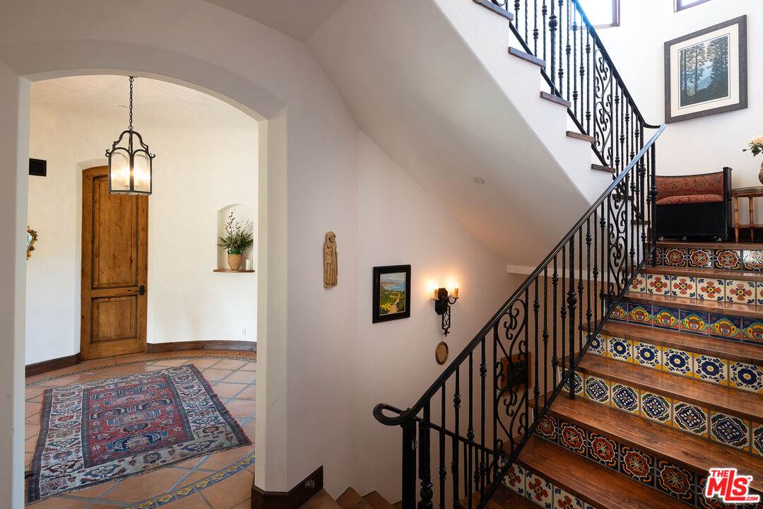 1101 Cold Canyon Road Calabasas, CA 91302 - Photo 22 of 60 a view of entryway and hall with wooden floor
