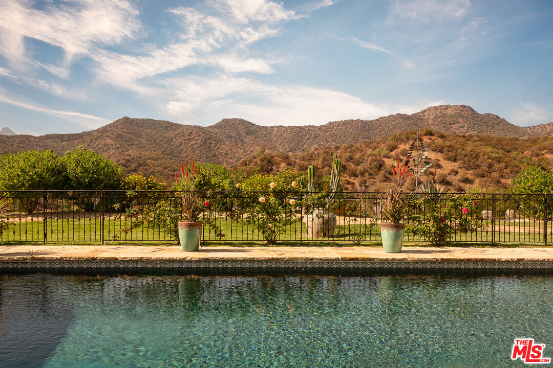 1101 Cold Canyon Road Calabasas, CA 91302 - Photo 45 of 60 a view of a lake with a mountain