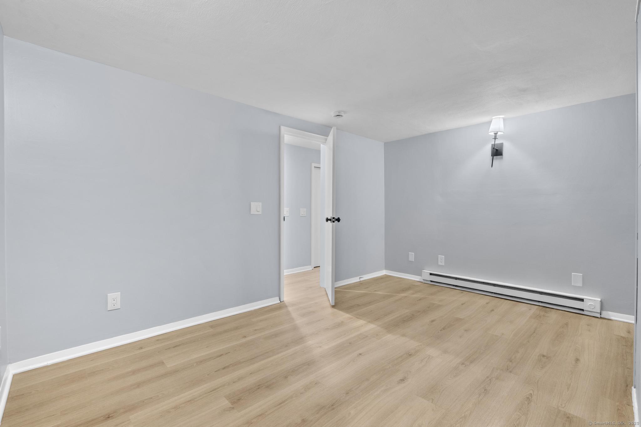 99 Roosevelt Avenue West Haven, CT 06516 - Photo 17 of 27 a view of an empty room