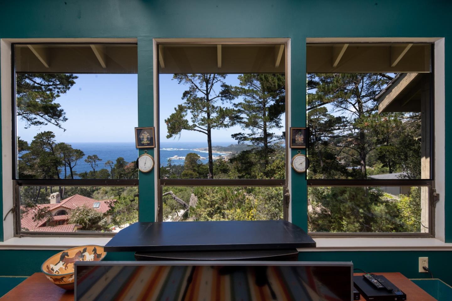 219 Peter Pan Road Carmel, CA 93923 - Photo 18 of 33 a view of a balcony with chairs and a potted plant