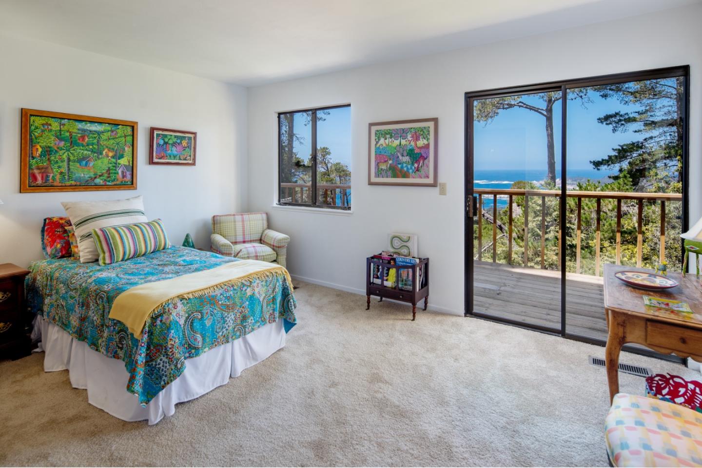 219 Peter Pan Road Carmel, CA 93923 - Photo 21 of 33 a bedroom with a bed and a couch