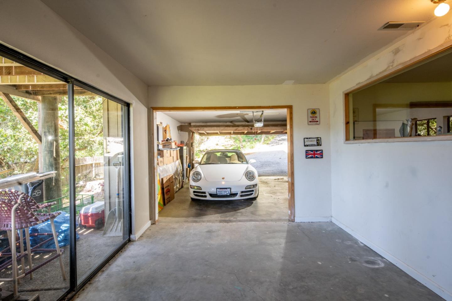 219 Peter Pan Road Carmel, CA 93923 - Photo 30 of 33 a bedroom with furniture and large windows