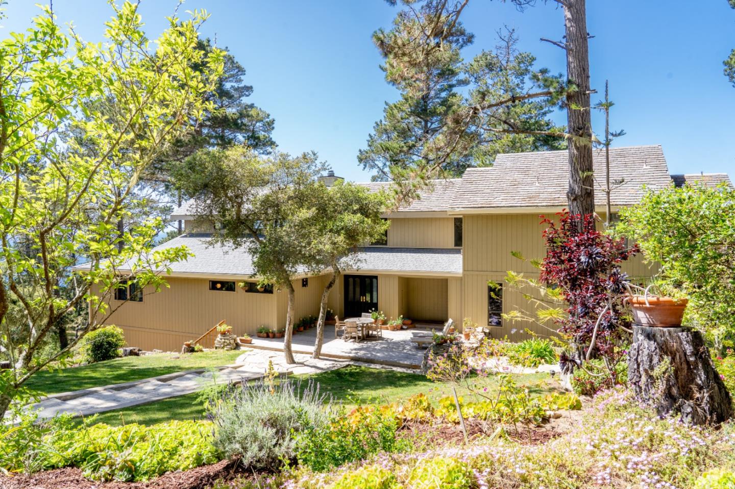 219 Peter Pan Road Carmel, CA 93923 - Photo 3 of 33 a view of a house with a yard and sitting area