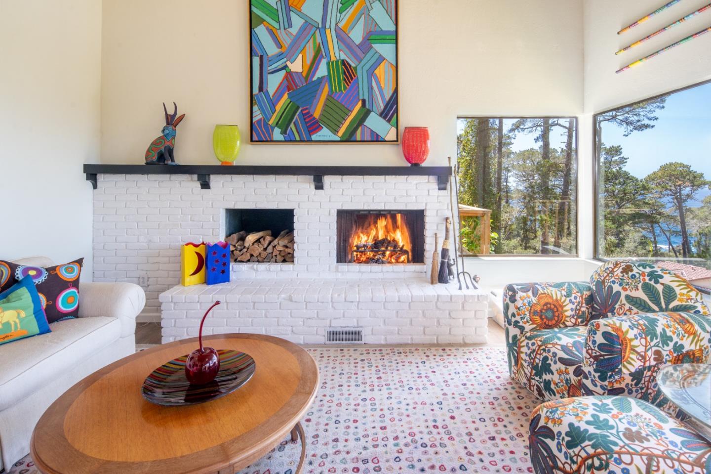 219 Peter Pan Road Carmel, CA 93923 - Photo 8 of 33 a living room with furniture and a fireplace