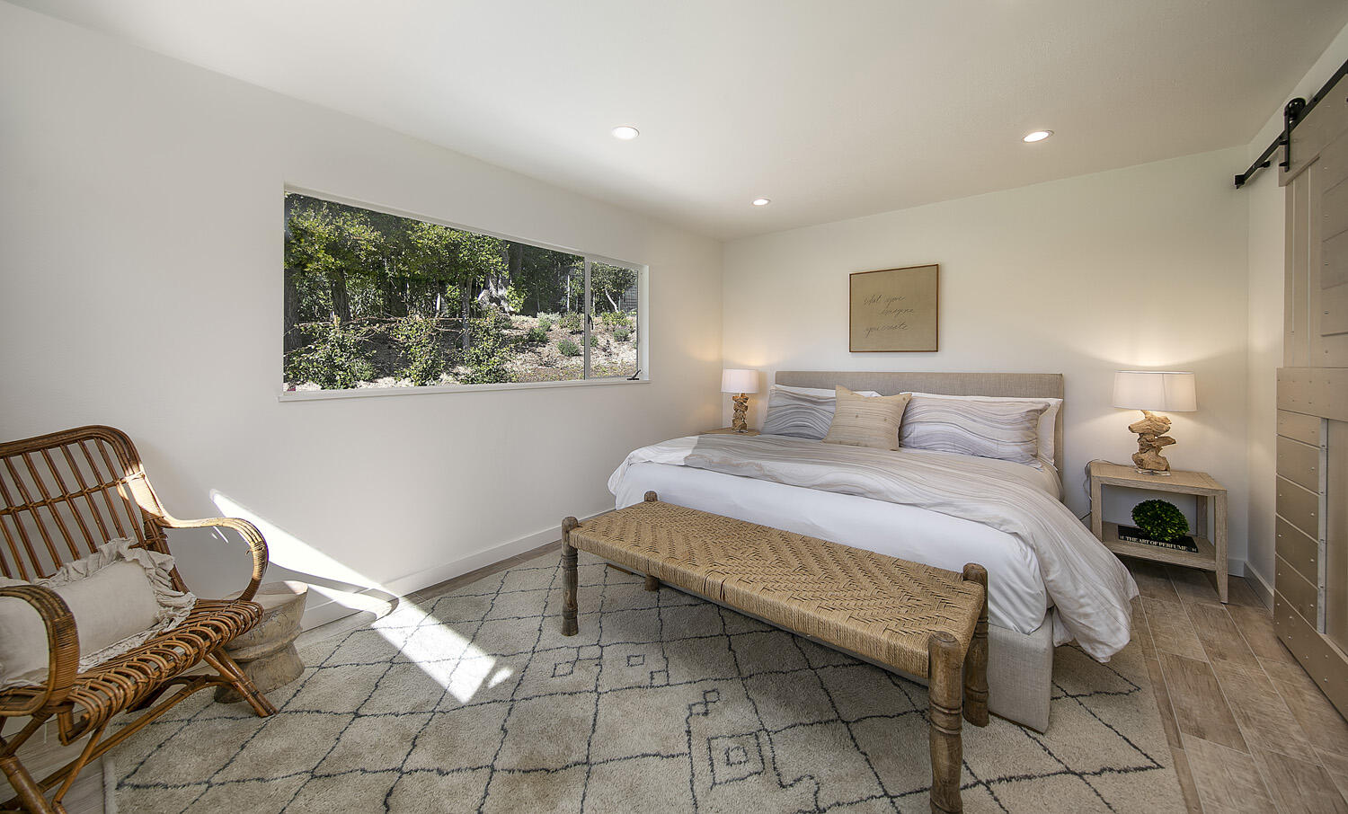 802 Oak Grove Drive Montecito, CA 93108 - Photo 12 of 20 a bedroom with a bed and a painting on the wall