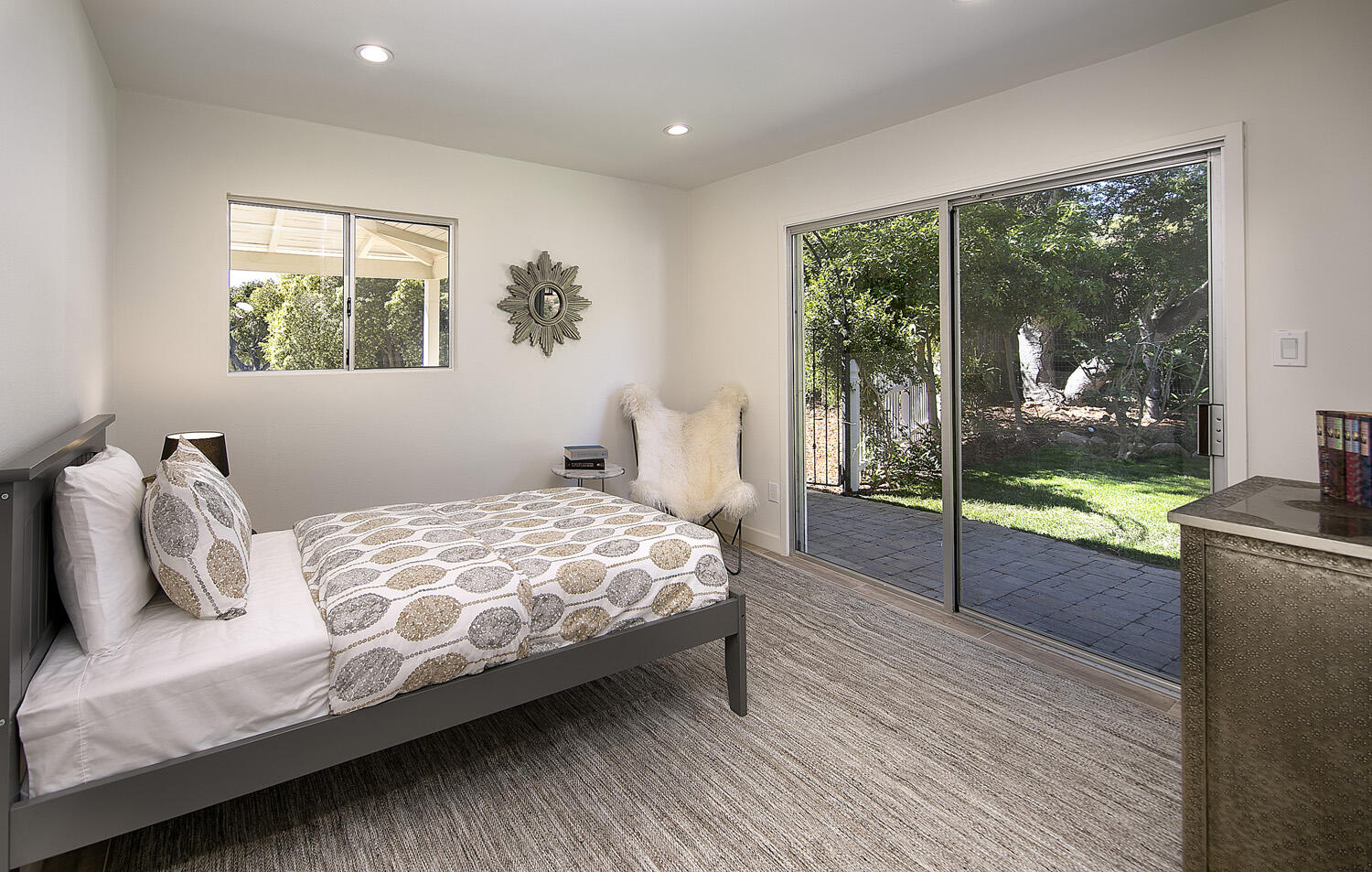 802 Oak Grove Drive Montecito, CA 93108 - Photo 15 of 20 a bedroom with a bed and wooden floor