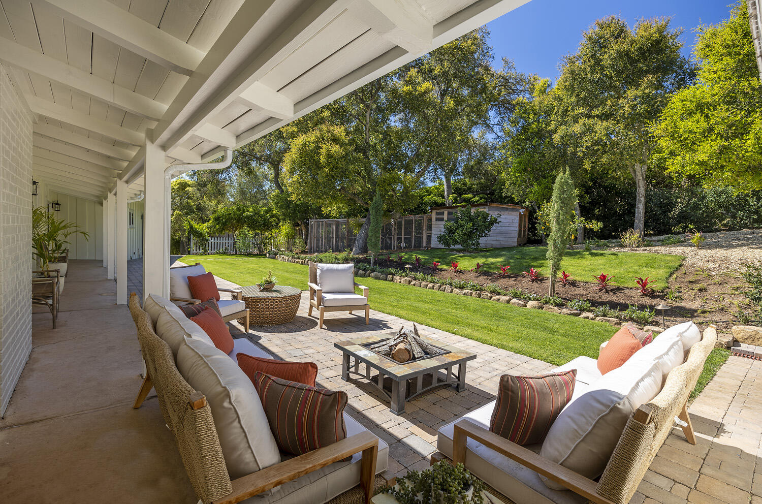 802 Oak Grove Drive Montecito, CA 93108 - Photo 16 of 20 a view of yard with seating area and trees around