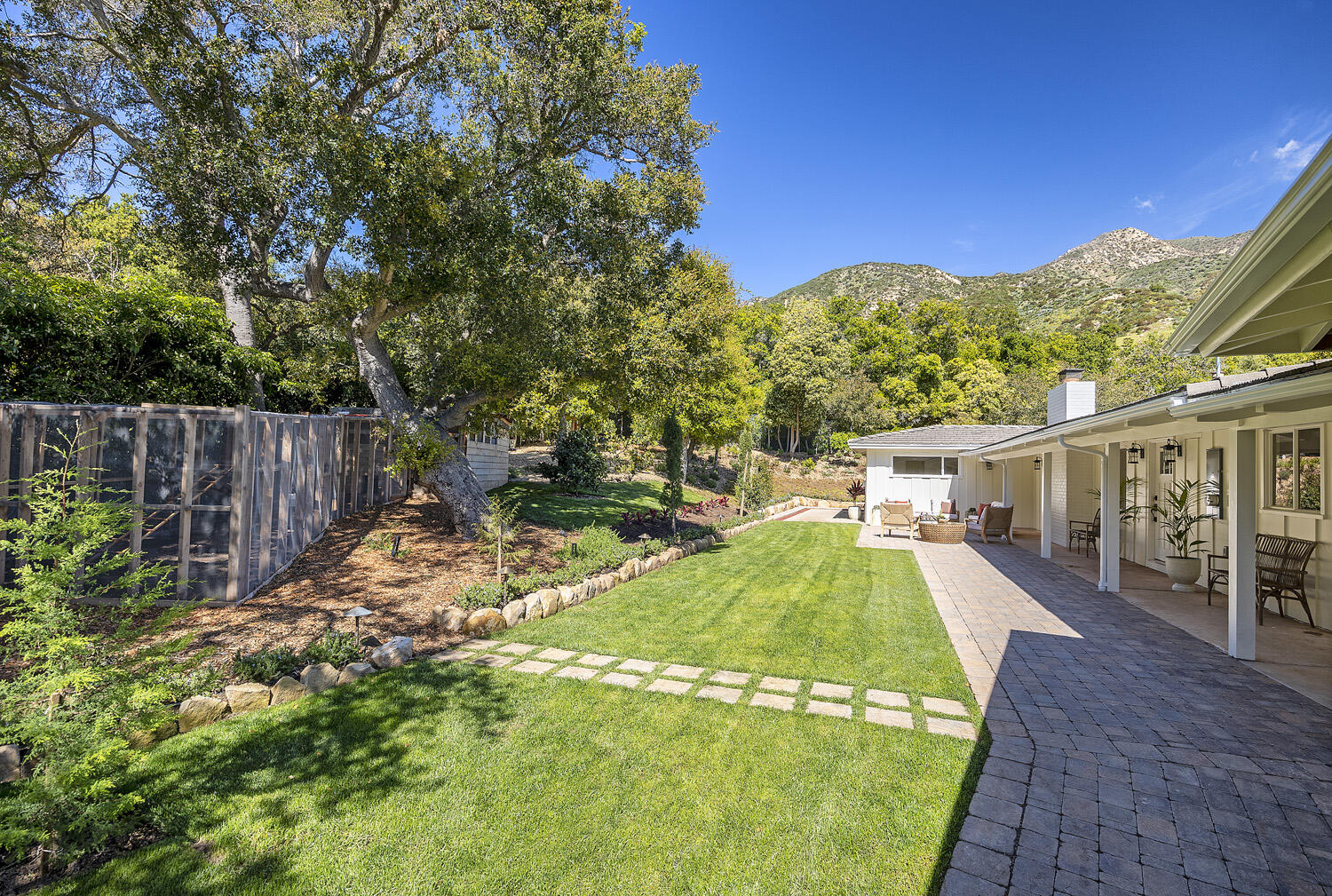 802 Oak Grove Drive Montecito, CA 93108 - Photo 2 of 20 a view of a backyard with pathway