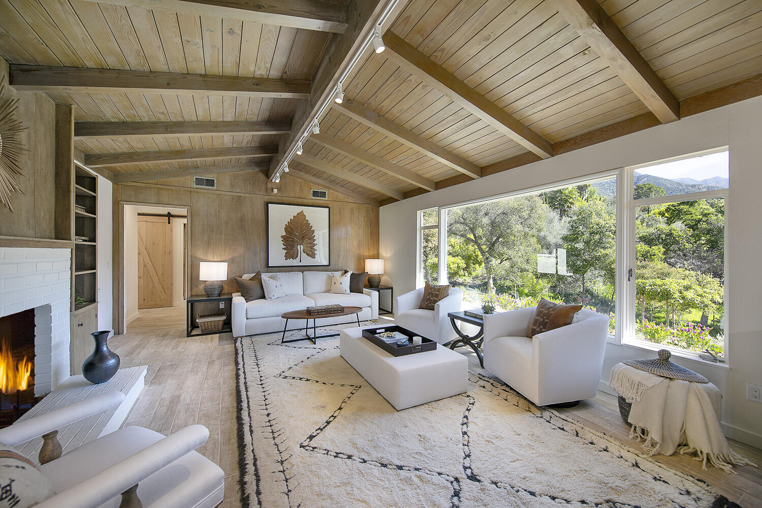 802 Oak Grove Drive Montecito, CA 93108 - Photo 5 of 20 a living room with furniture and a large window