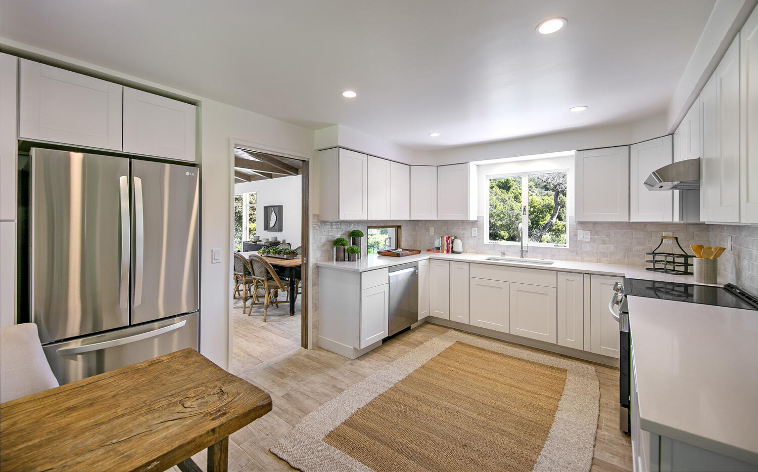802 Oak Grove Drive Montecito, CA 93108 - Photo 9 of 20 a kitchen with stainless steel appliances granite countertop a refrigerator sink and cabinets